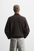 QUARTER ZIP SWEATER