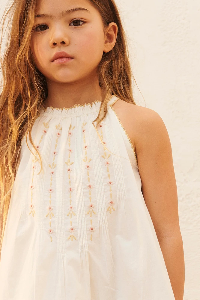 ROBE HALTER À FLEURS BRODÉES ÉDITION LIMITÉE