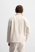SURCHEMISE EN DENIM DÉLAVÉ