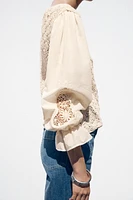 POINTELLE KNIT SWEATER WITH CONTRASTING SLEEVES