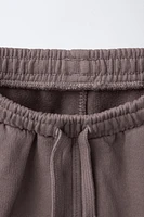 LOGO PLUSH SHORTS