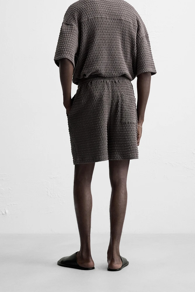IRREGULAR TEXTURED BERMUDA SHORTS