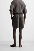 IRREGULAR TEXTURED BERMUDA SHORTS