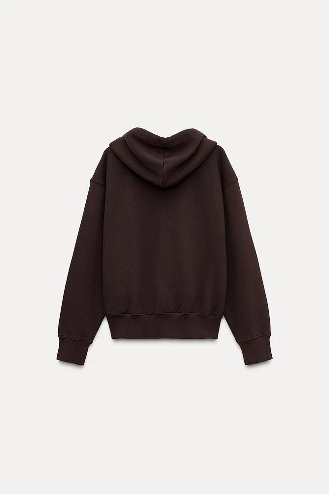 SWEAT ZIPPÉ EFFET DÉLAVÉ
