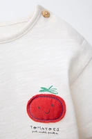 T-SHIRT À PIÈCE TOMATE