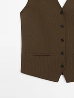 Veste sans manches en maille à encolure américaine