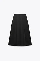 SOFT BUTTON MIDI SKIRT