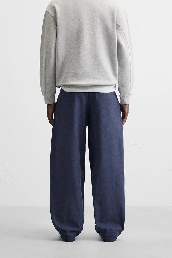 JEAN RELAXED FIT À PLIS