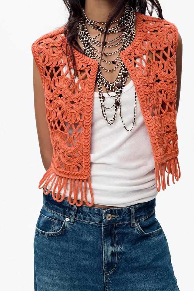 GILET EN MAILLE À FRANGES