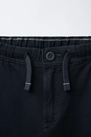 TEXTURED STRETCH PANTS