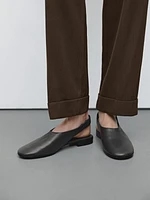 Suit trousers with turn-up hems