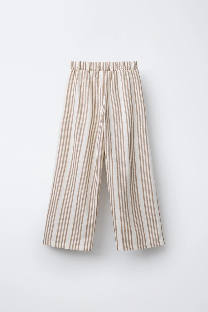 STRIPED PANTS WITH PIPED POCKETS