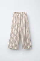 STRIPED PANTS WITH PIPED POCKETS