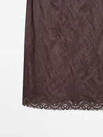 Mini dress with blonde lace detail
