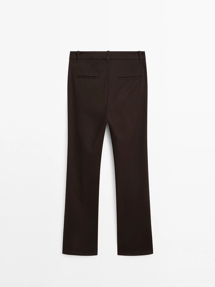 Pantalon slim flare taille basse