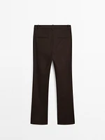 Pantalon slim flare taille basse