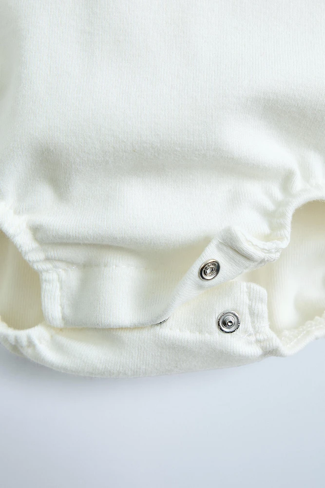 BODY MOLLETON BRODERIES COL COMBINÉ