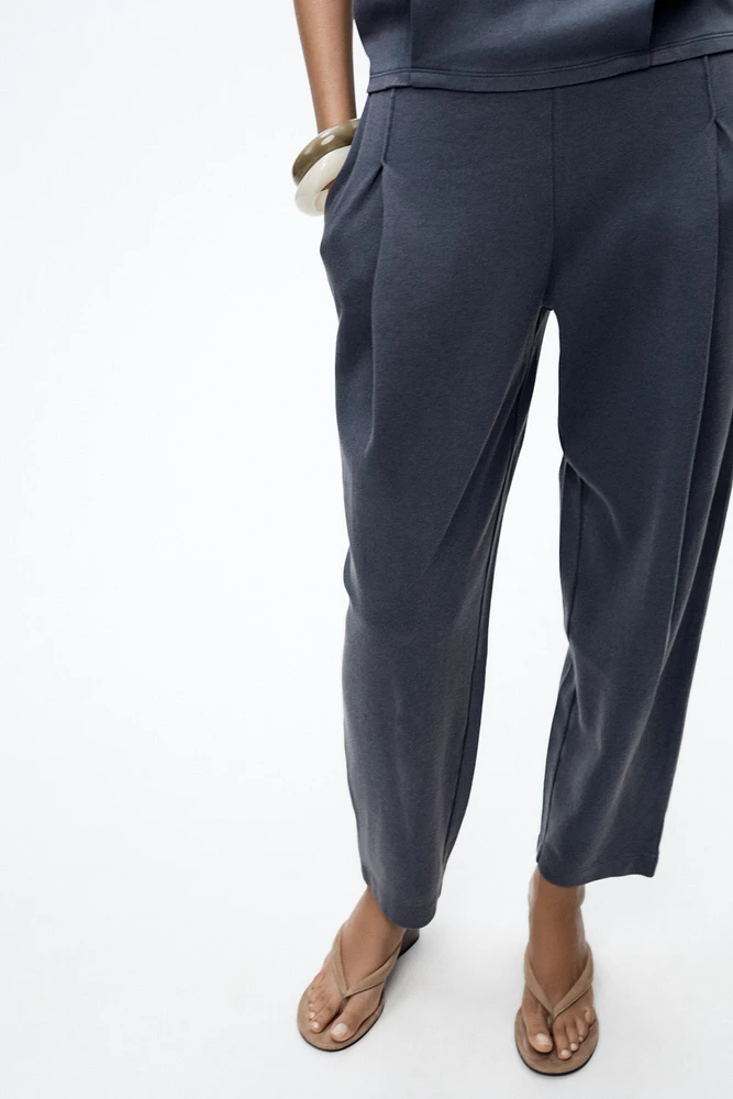 WASHED PLEATED PANTS