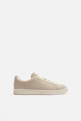 BASKETS EN CUIR