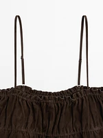Gathered suede leather top with straps