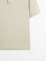 Cotton blend polo shirt with snap button