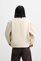 BLOUSON AVEC COL BIMATIÈRE