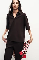 ZIP POLO COLLAR TOP