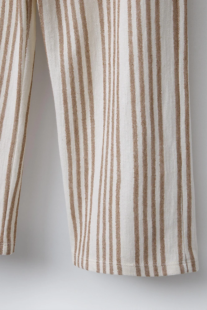 STRIPED PANTS WITH PIPED POCKETS