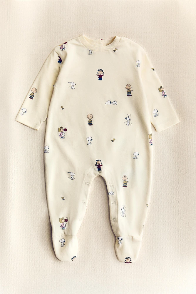 PEANUTS™ CHILDREN’S FOOTED ROMPER