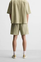 TEXTURED EMBROIDERED SHORTS