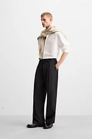 PLEATED PANTS WITH BELT
