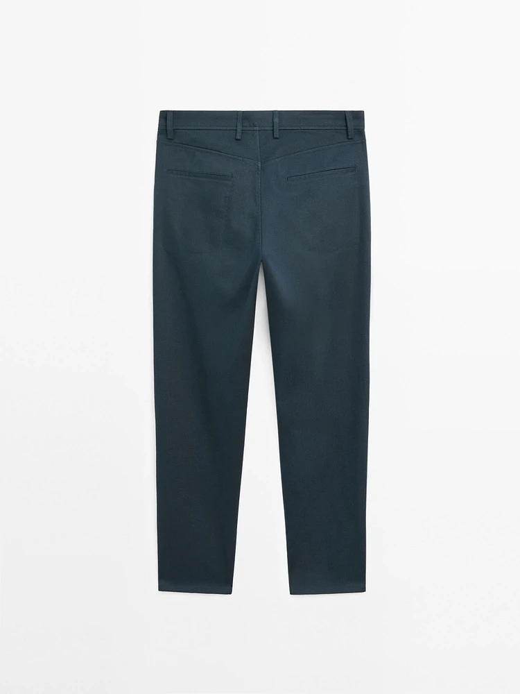 Faux jean tapered fit en coton mélangé