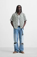 CHEMISE STRUCTURÉE AJOURÉE