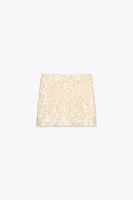 MINI JUPE À PAILLETTES