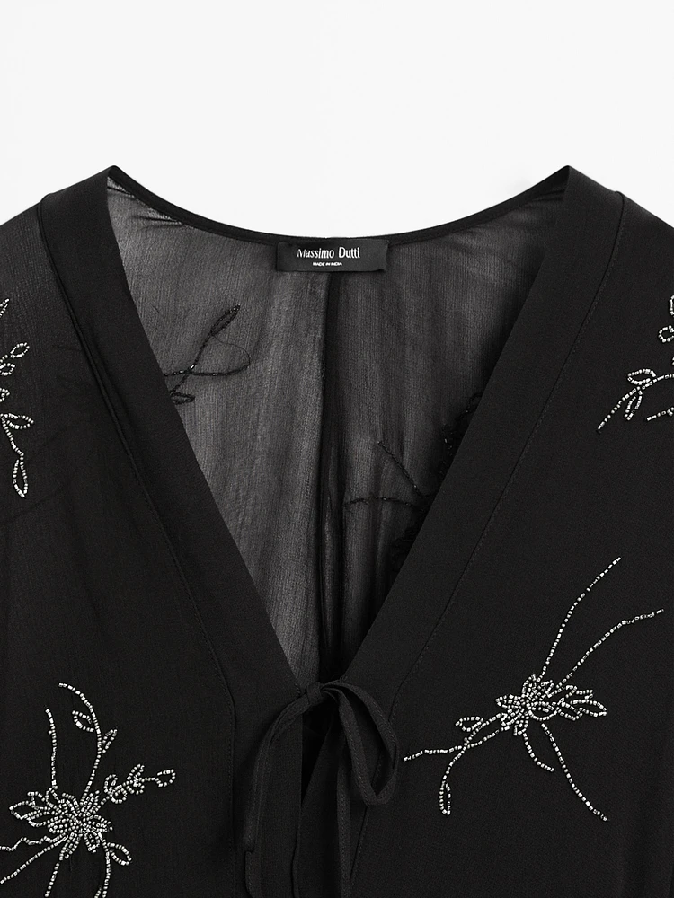 Robe midi fluide avec broderies