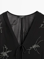 Robe midi fluide avec broderies