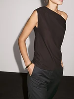 Top asymétrique avec nœud