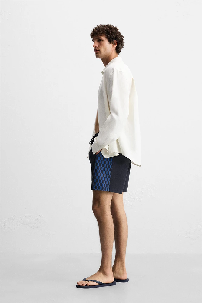 MAILLOT DE BAIN LONG À BANDES CARREAUX