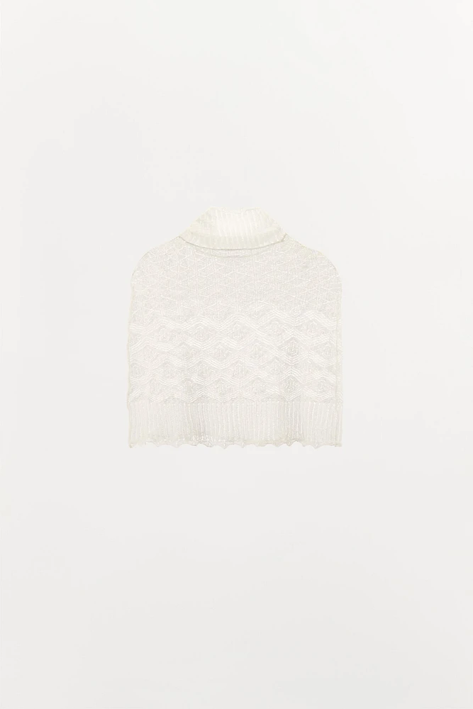 CAPE EN MAILLE TRICOT