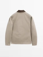 Short jacket with leather collar detail