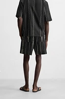 CONTRAST EMBROIDERY SHORTS