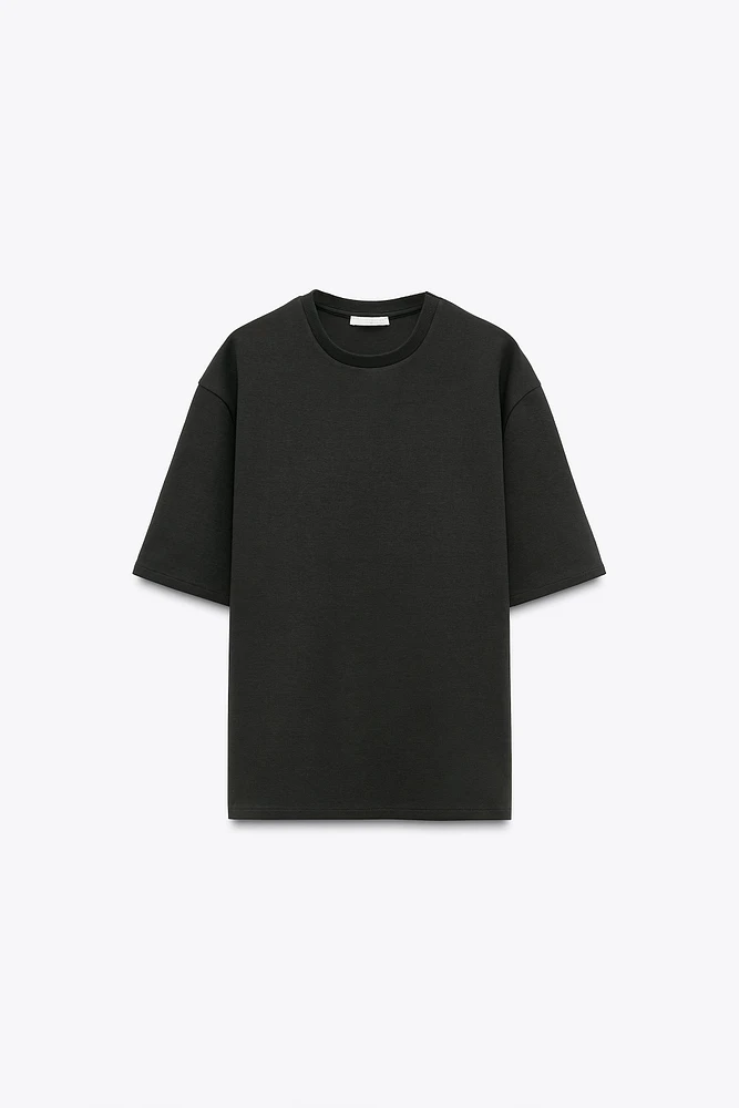 SWEAT EN MAILLE SURJET À MANCHES COURTES