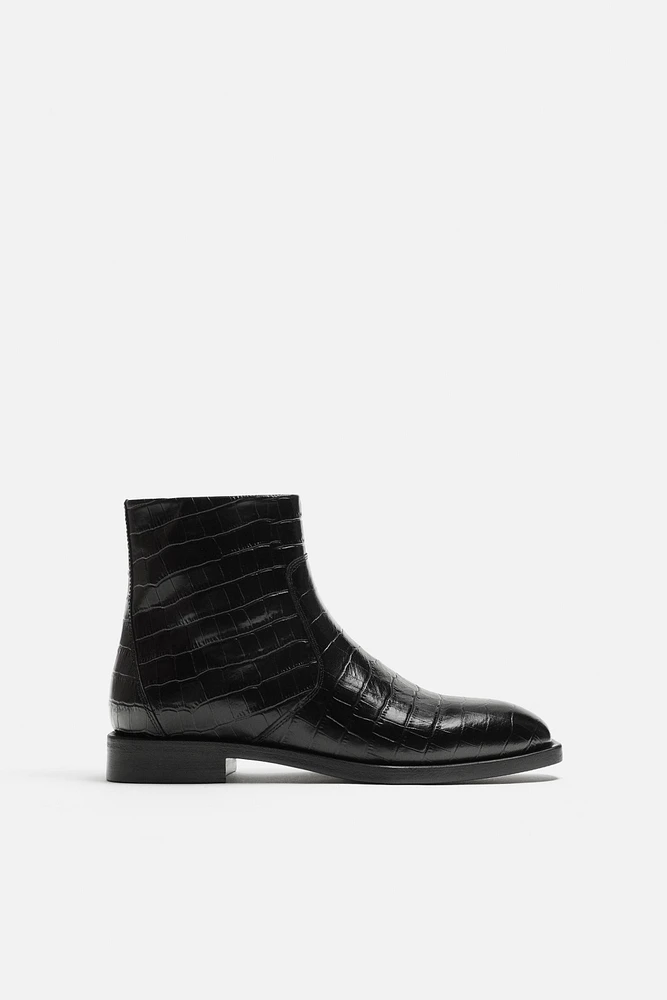 EMBOSSED LEATHER BOOTS
