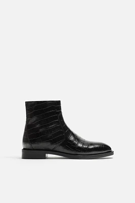 EMBOSSED LEATHER BOOTS