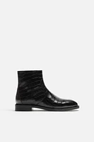EMBOSSED LEATHER BOOTS