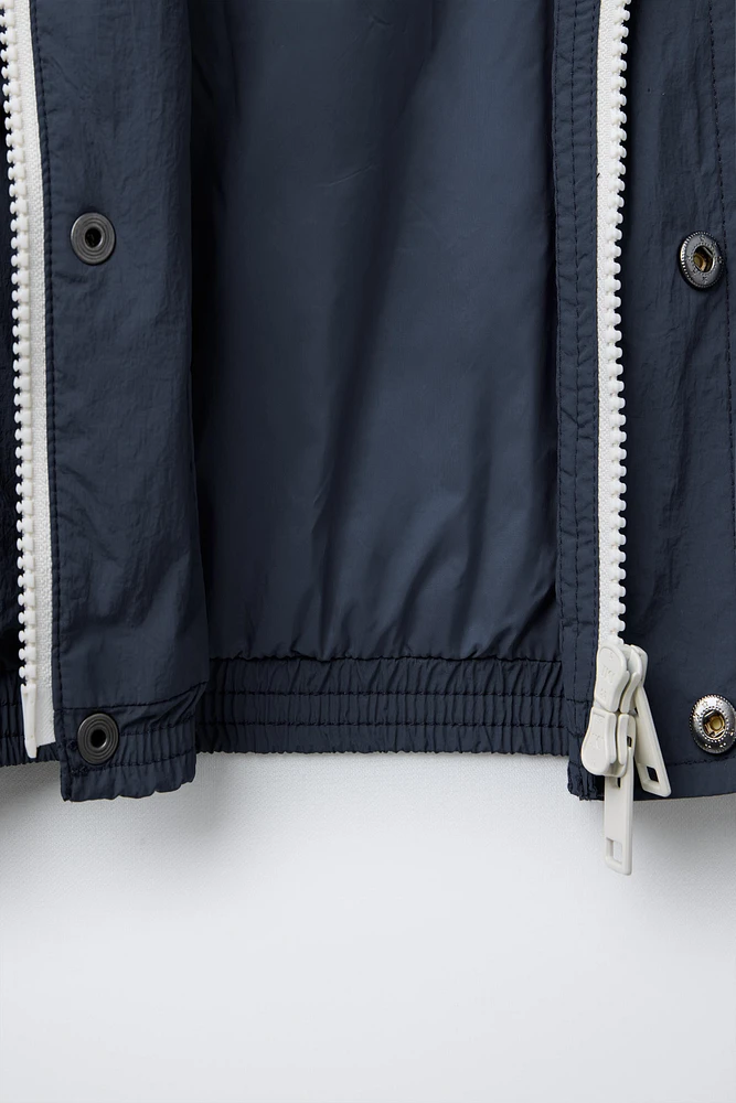 COMBINED LIGHTWEIGHT TECHNICAL RAINCOAT