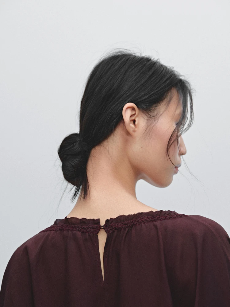 Flowing blouse with gathered detail