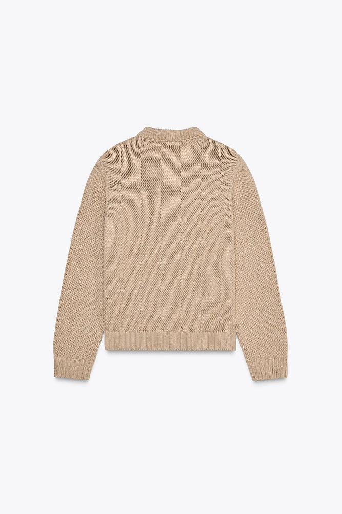 GILET EN MAILLE À LOSANGES