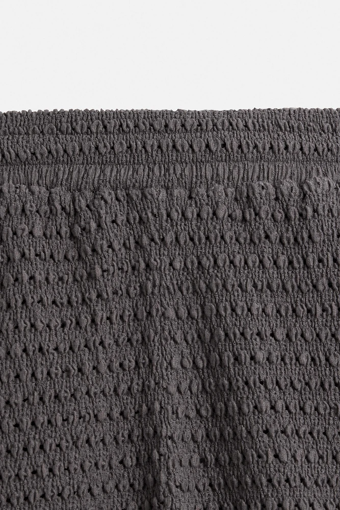 IRREGULAR TEXTURED BERMUDA SHORTS