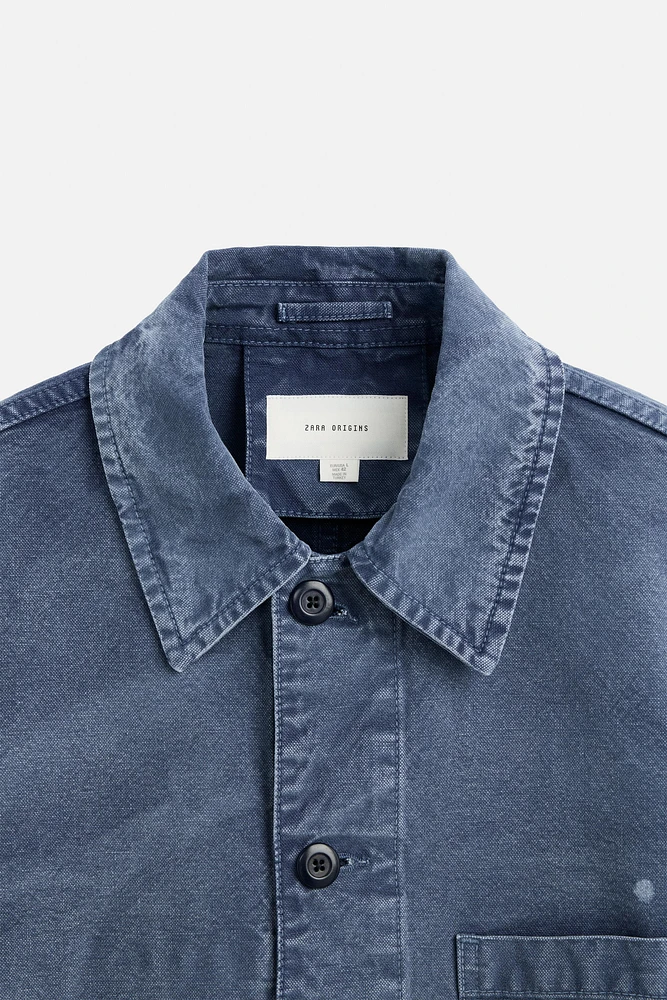 VESTE LAVAGE ÉCLABOUSSURES